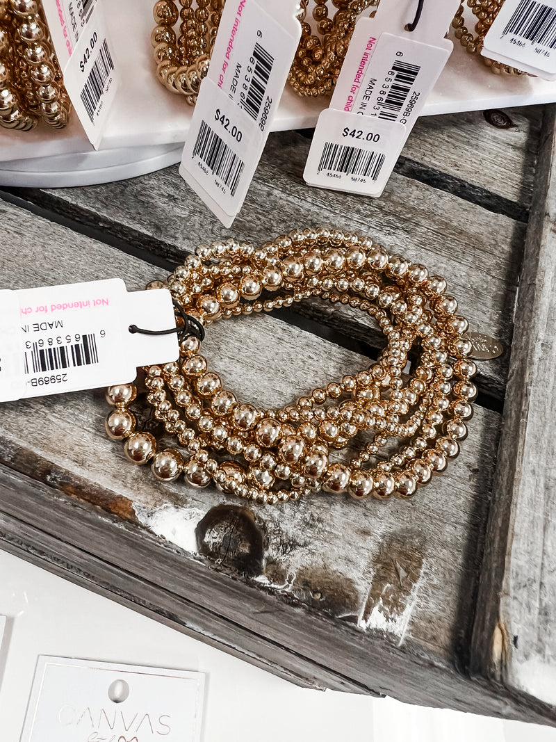 Caroline's Gold Bracelet Stack