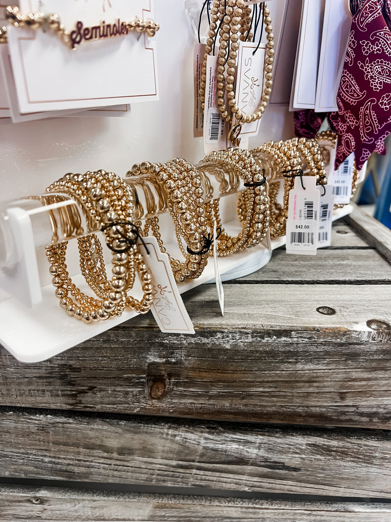 Caroline's Gold Bracelet Stack